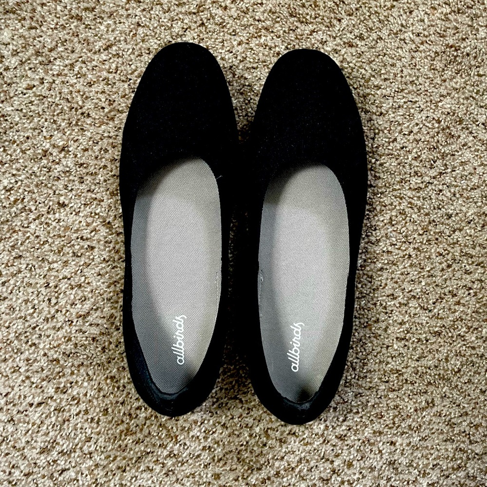 Black woman’s flat shoes